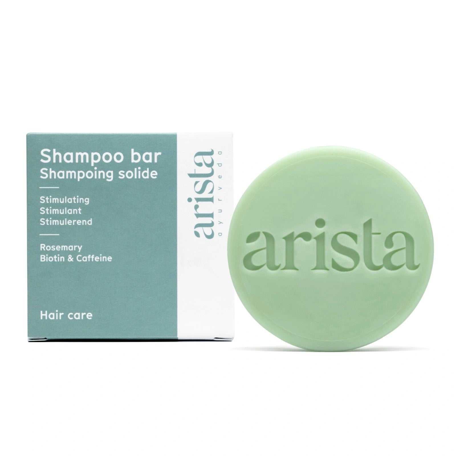Arista stimulating shampoo bar with packaging on a white background