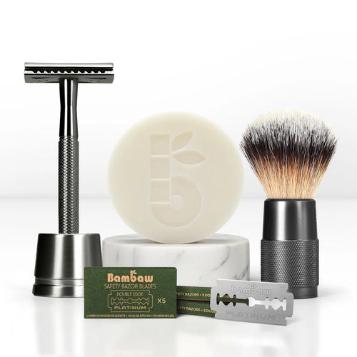 Bambaw Shaving set with safety razor, brush, soap, and blades on a white background