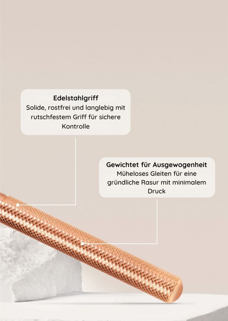 bambaw Rose gold metal safety razor handle with text on a neutral background